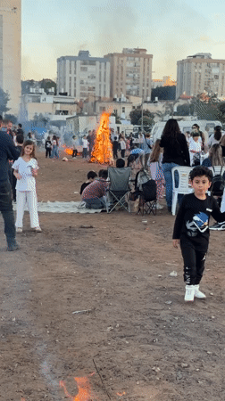 Community bonfire gathering draws families in Netanya