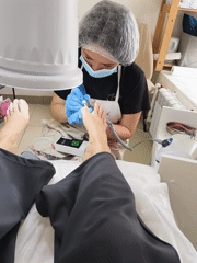 Woman documents spa day with selfies and pedicure treatment