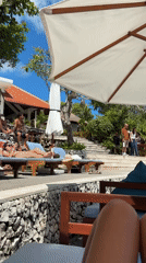 Morning poolside leisure activities observed at Kuta Selatan resort