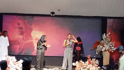 Stage performance with choir and speakers in Jos