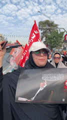 Poster held up at a public gathering in Tehran