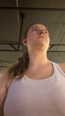Woman observed looking upward in Belgrade evening scene