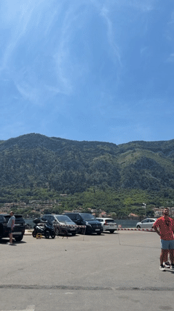Tourist scenes documented across Kotor's harbor and marketplace Sunday morning