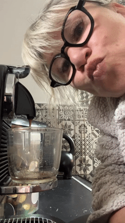 Woman prepares coffee, drinks beverage in Chambœuf morning routine