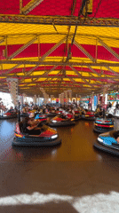 Families enjoy bumper car rides at Fuengirola amusement venue