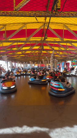 Families enjoy bumper car rides at Fuengirola amusement venue