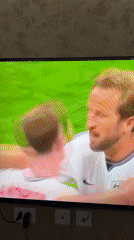 England vs Congo DR match playing on TV in Tashkent