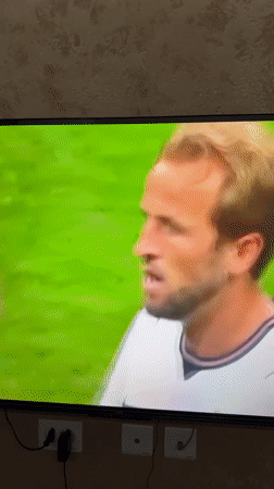 England vs Congo DR match playing on TV in Tashkent