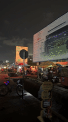 Evening traffic flows through Accra streets