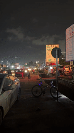 Evening traffic flows through Accra streets