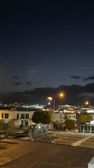 Nighttime fireworks display lights up Playa Blanca, Spain