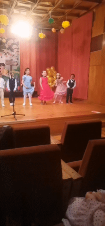 Children's formal performance and certificate ceremony in Obrochishte, Bulgaria