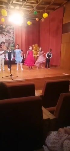 Children's formal performance and certificate ceremony in Obrochishte, Bulgaria