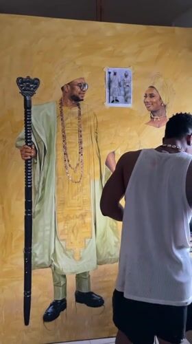Artist paints traditional figures in Ado, Nigeria studio