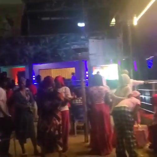 Nighttime outdoor party documented in Akwanga, Nigeria