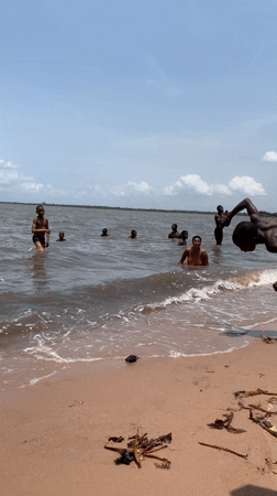 Children enjoy beach day swimming and playing in Ikorodu