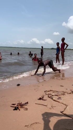 Children enjoy beach day swimming and playing in Ikorodu