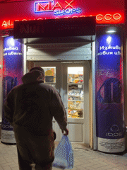 Evening street life documented across Varna, Bulgaria commercial district