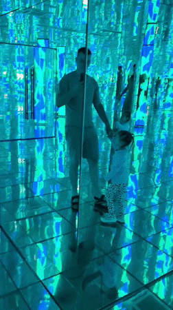 Father-daughter visit interactive art exhibition in Kazan, Russia