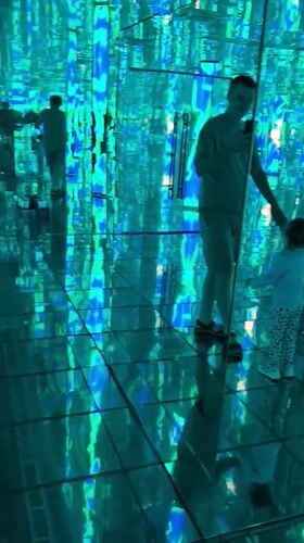 Father-daughter visit interactive art exhibition in Kazan, Russia