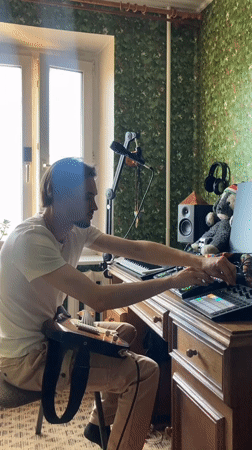 Musician works on production setup in Ufa, Russia