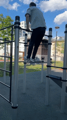 Man exercises on outdoor fitness equipment in Moscow
