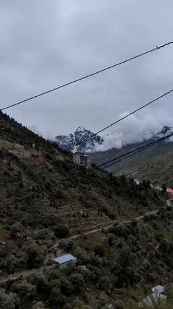 Utility poles and mountain views from Keylong, Himachal Pradesh