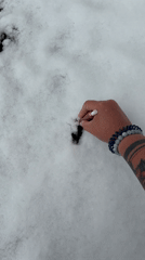 Woman documents snowy morning through windows and selfies in Perm