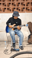 Live band performs at Indonesian coffee shop for evening patrons