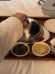 Hotel guest enjoys room service, spa treatment, coffee outing