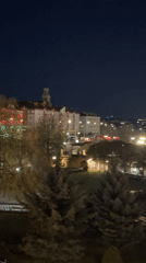 Nighttime panoramic view captured of illuminated Hrodna, Belarus cityscape