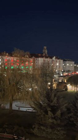Nighttime panoramic view captured of illuminated Hrodna, Belarus cityscape
