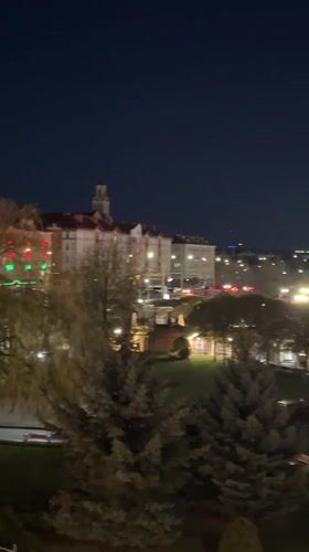 Nighttime panoramic view captured of illuminated Hrodna, Belarus cityscape