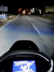 Nighttime scooter ride recorded on Lhokseumawe road