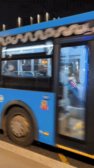 Night buses rolling through quiet Moscow streets