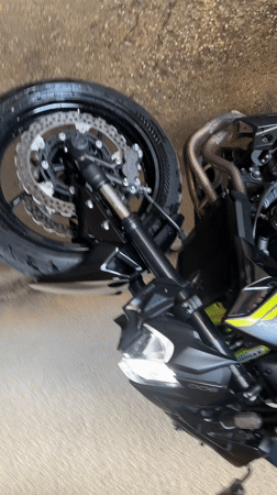 Kawasaki motorcycle spotted on wet pavement in Ledenik, Bulgaria