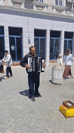 Accordion player performs in Varna public square