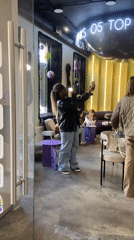 Woman visits Asian bubble tea cafe in Kazan, Russia