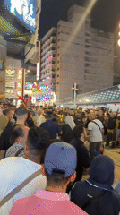 Street band draws crowds in busy Kuala Lumpur district