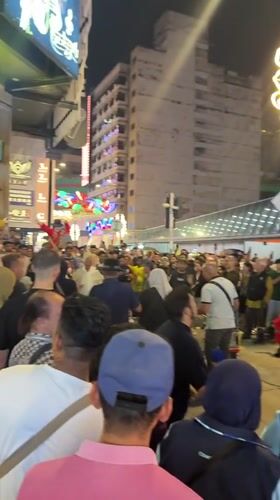 Street band draws crowds in busy Kuala Lumpur district