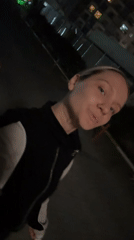 Woman takes nighttime selfies in Esenyurt residential district