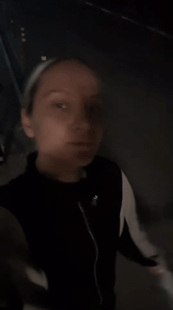 Woman takes nighttime selfies in Esenyurt residential district