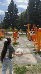 Children play at outdoor recreation facilities in Agarak, Armenia