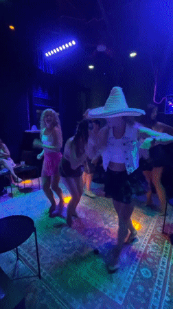 Women dance and sing karaoke at Thailand entertainment venue