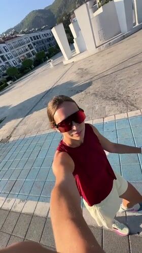 Selfie stroll through a sunny Fethiye public square