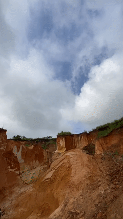 Clay quarry work underway at a red-soil pit in Achara, Nigeria