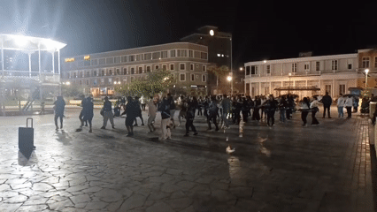 Group exercise session held in Iquique plaza at midnight