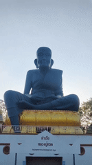 Tourist documents Thai temple statues and grounds in Baan Bo Phut