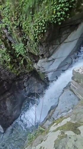 Visitor documents Kostenets Waterfall and forest streams in Bulgaria