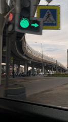 Elevated rail structure filmed from vehicle in Saint Petersburg